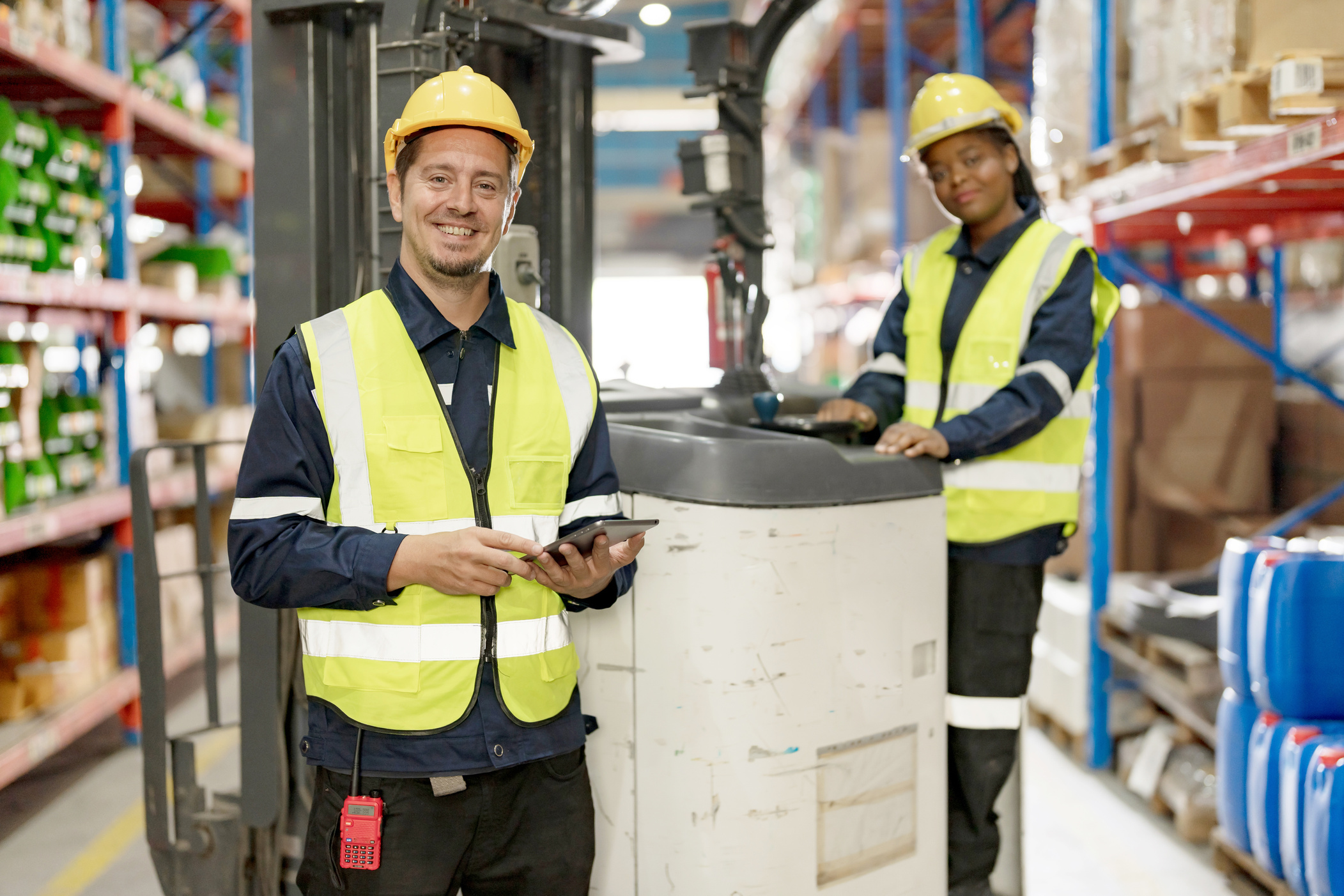Female and male employees Check product.